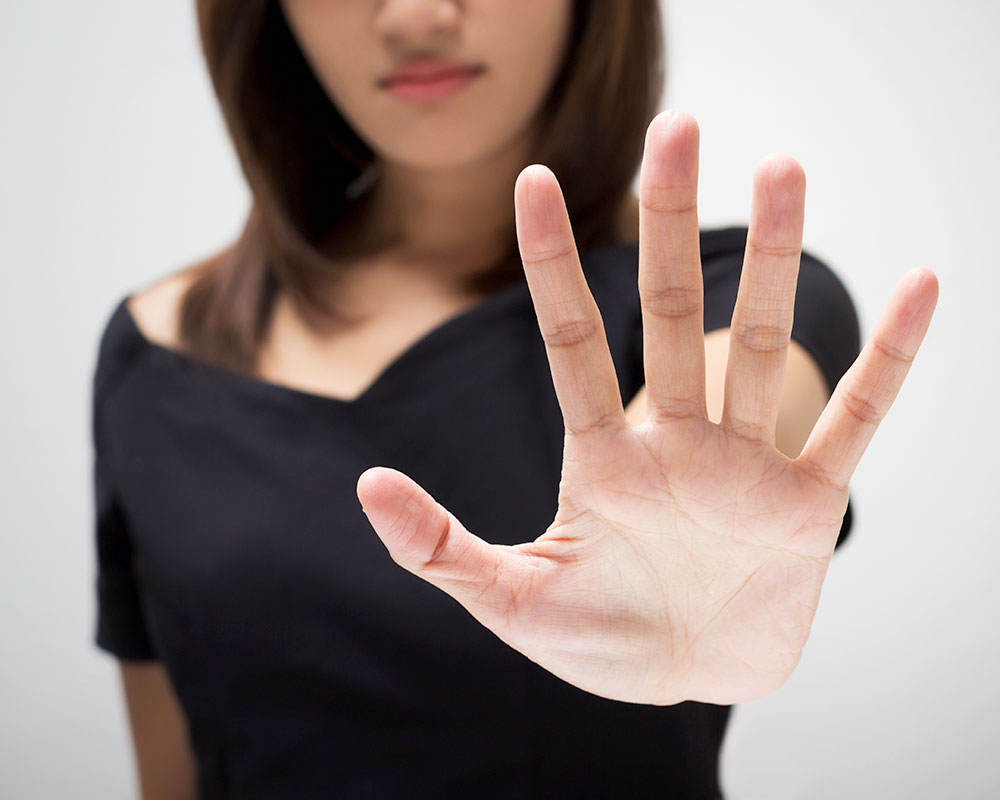 Das Bild ist ein Symbolfoto einer Hand, die 'Stopp' signalisiert.